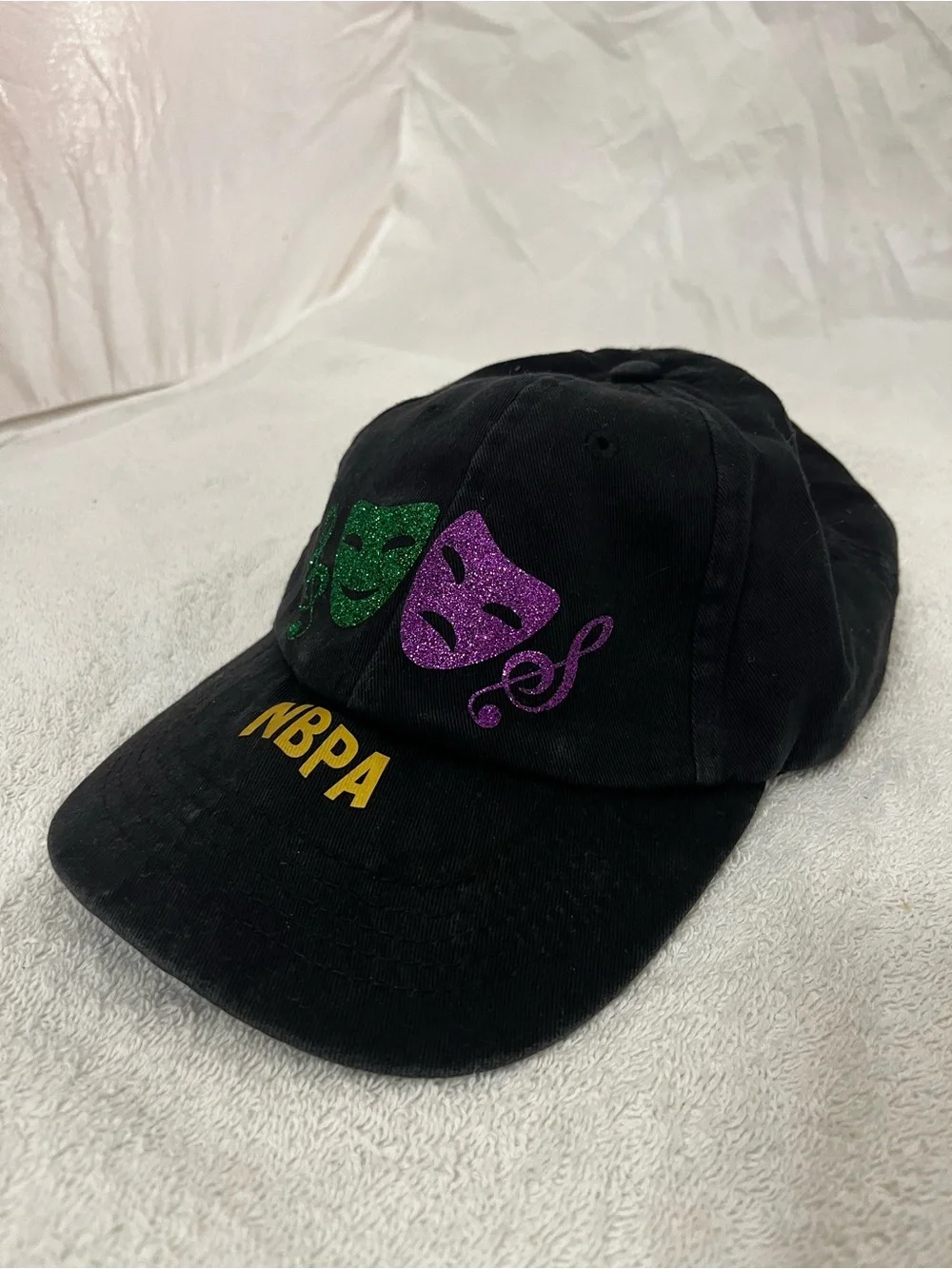 NBPA New Braunfels Black Cap with Green & Purple Theatrical Mask